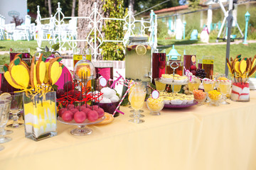 Delicious sweeties and beverages, staying on dessert table