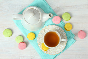 Serving table with sweets in gentle colors.