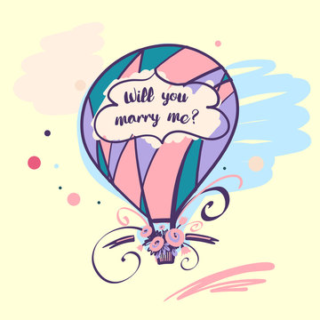 Ballon with text will you marry me and flower