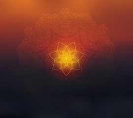 Fototapeta premium Shiny mandala on blurred background. Blur sunset colors. Sacred geometry. Indian traditional ethnic ornament. For yoga studio or meditation classes, flyer, card, invitation. Vector EPS10 illustration.