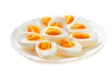 Halved Eggs isolated on white  background closeup