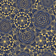 
Seamless pattern.  Tribal texture with a mandala element.