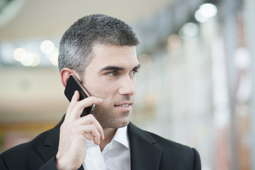 Close-up of businessman on mobile phone