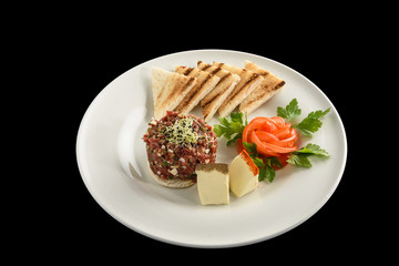 tasty Steak tartare (Raw beef) - classic steak tartare on white plate