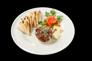 tasty Steak tartare (Raw beef) - classic steak tartare on white plate