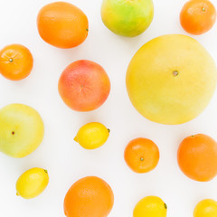 Citrus pattern made of lemon, orange, grapefruit, sweetie and pomelo on white background. Flat lay, top view.