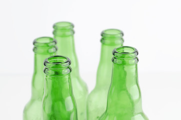 Green Empty Beer Bottles On White Background Closeup