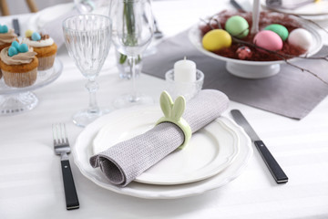 Beautiful Easter table setting in light room