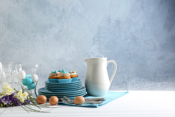Beautiful Easter table setting with blue plate
