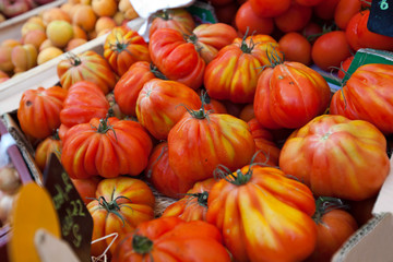 Close-up of tomatoes on display in store
