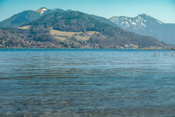 View of the alpine lake Tegernsee in Bavaria with mountains in the background