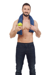 Cheerful shirtless man with apple