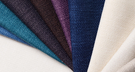 Bright collection of gunny textile samples. Multicolor Fabric texture background.