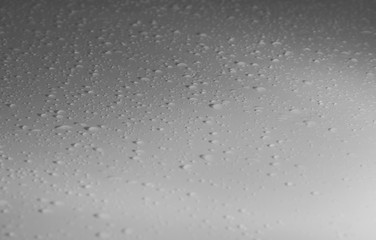 Water drops on steel surface with selective focus