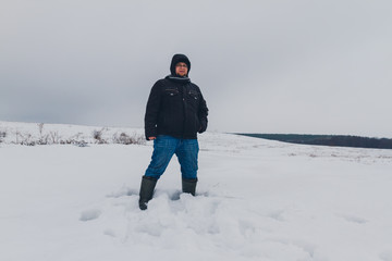 Fototapeta na wymiar Man in the winter steppe