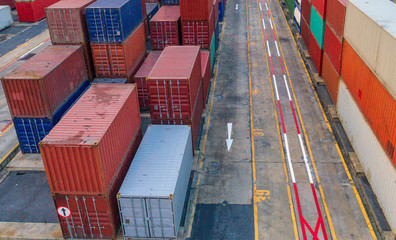 container ship in import export and business logistic.By crane ,Trade Port , Shipping, cargo to...