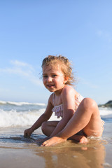 Girl Playing on Beach