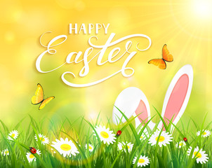 Yellow background with Easter bunny in grass