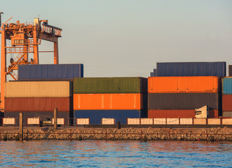 container ship in import export and business logistic.By crane ,Trade Port , Shipping.cargo to...