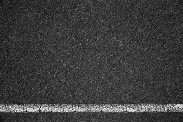 Fototapeta premium Asphalt background texture with some fine grain of road