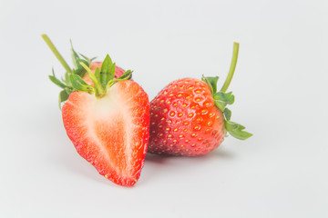 Strawberries with leaves. Isolated on a white background.