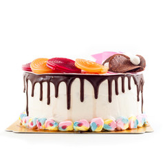 Sweet and colorful chocolate birthday cake with bright and vivid candy