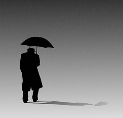 uomo con ombrello sotto la pioggia