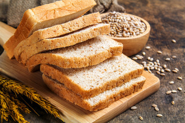 slice brown bread and white bread isolated on background