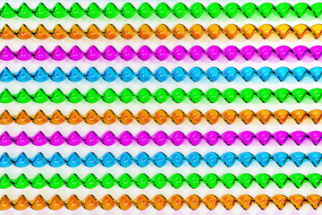 Glass spiral sticks different colors on white background