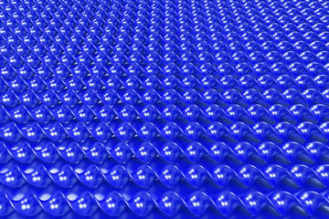 Naklejka premium Blue plastic spiral sticks on blue background