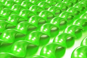Fototapeta premium Green plastic spiral sticks on green background