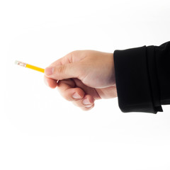 man holds yellow pencil in one hand