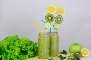 Green smoothies with kiwi, apple and cucumber