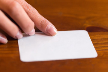 Obraz premium Credit card in female hands beautiful