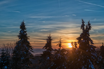 Amazing evening with sunset in mountains. Beautiful sunset within inversion