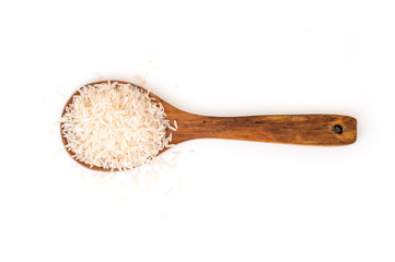 Heap of Jasmine white raw rice on wooden spoon