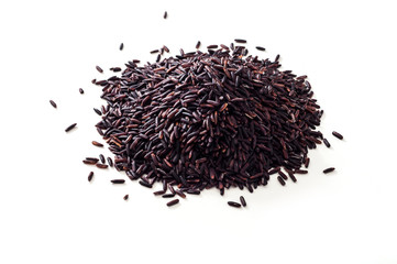 Heap of raw black rice on white background