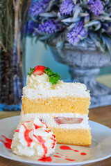 strawberry cake on white plate