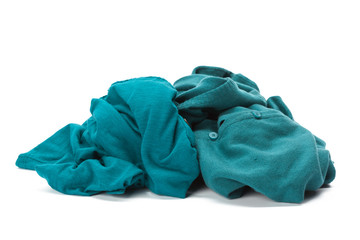 Stack of clothes on white background, closeup