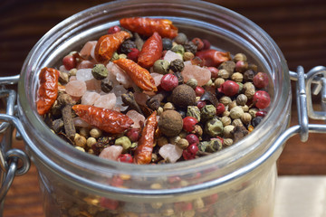 jar of different spices and herbs.