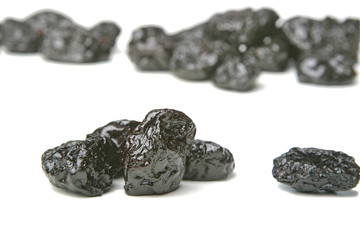 Studio shot of prunes on white background