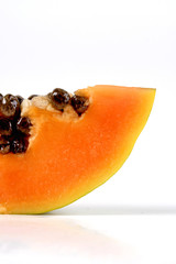 Papaya on white background - close-up