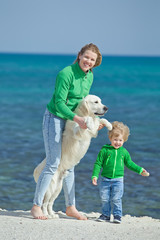 Woman and child with dog 