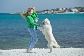 Woman and child with dog 