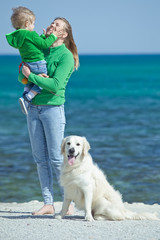 Woman and child with dog 