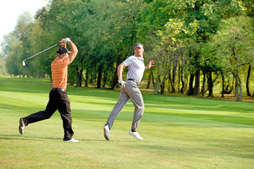 Friends having fun in golf course
