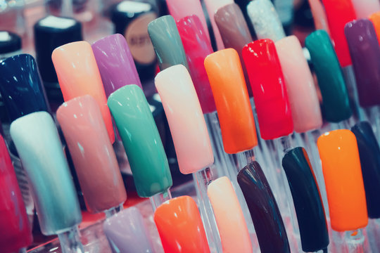 colorful artificial nails in beauty shop