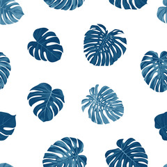 Indigo vector pattern with monstera palm leaves on dark background. Seamless summer tropical fabric design.