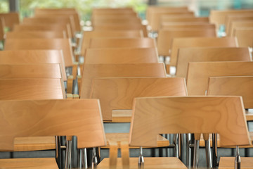 Rows of empty chairs in office