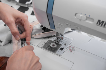 sewing machine and item of clothing